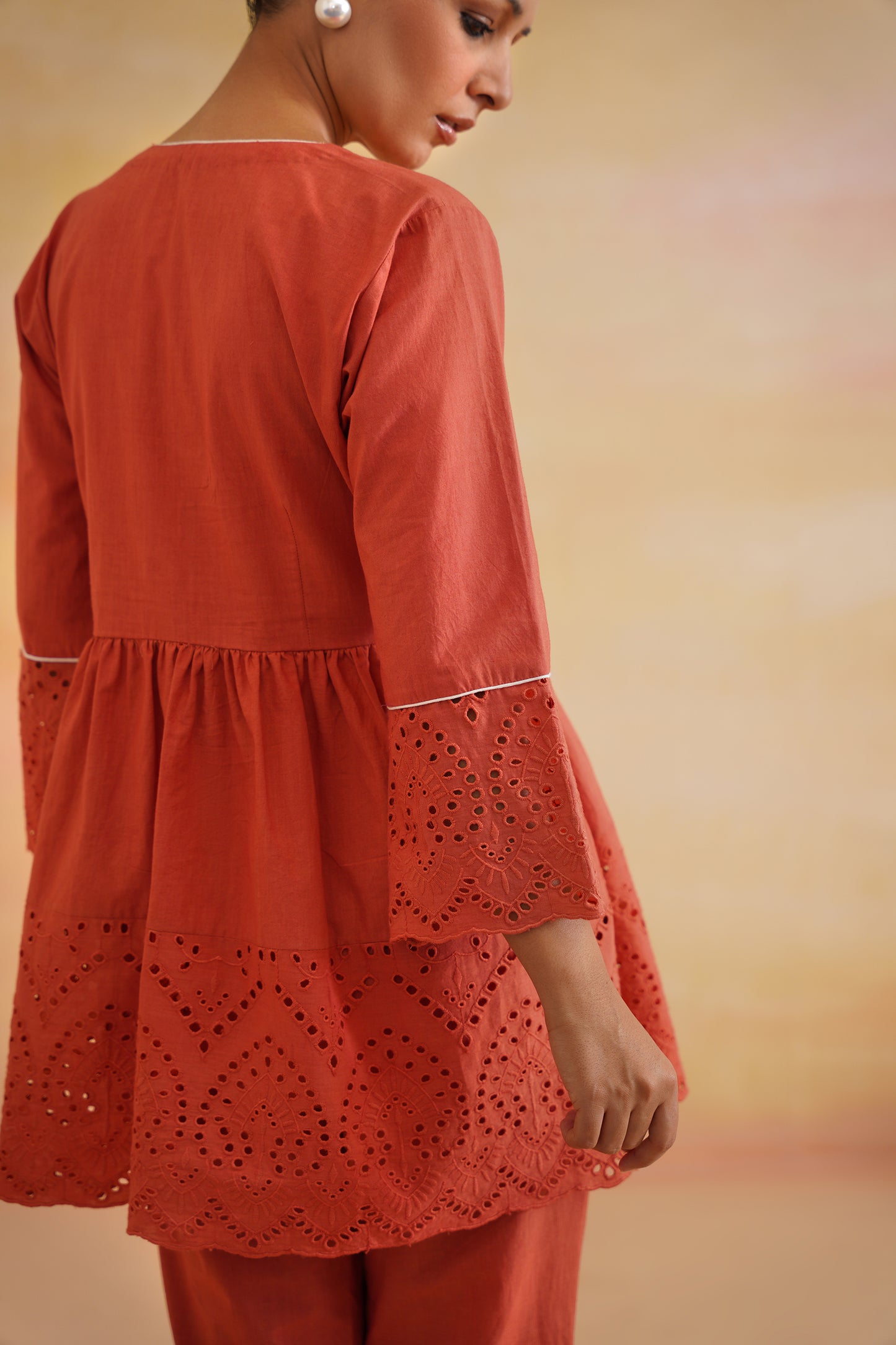 Nayra Burnt Orange Peplum Set